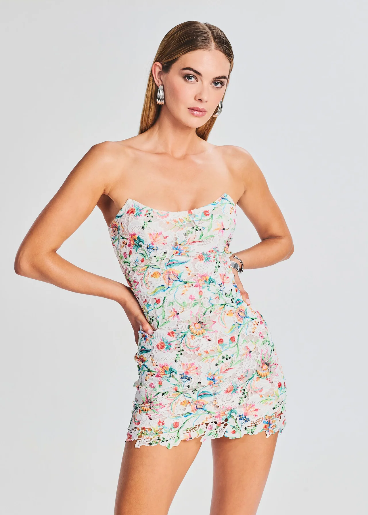 Rococo Sand mini white lace strapless scoop neck dress with colorful floral print.
