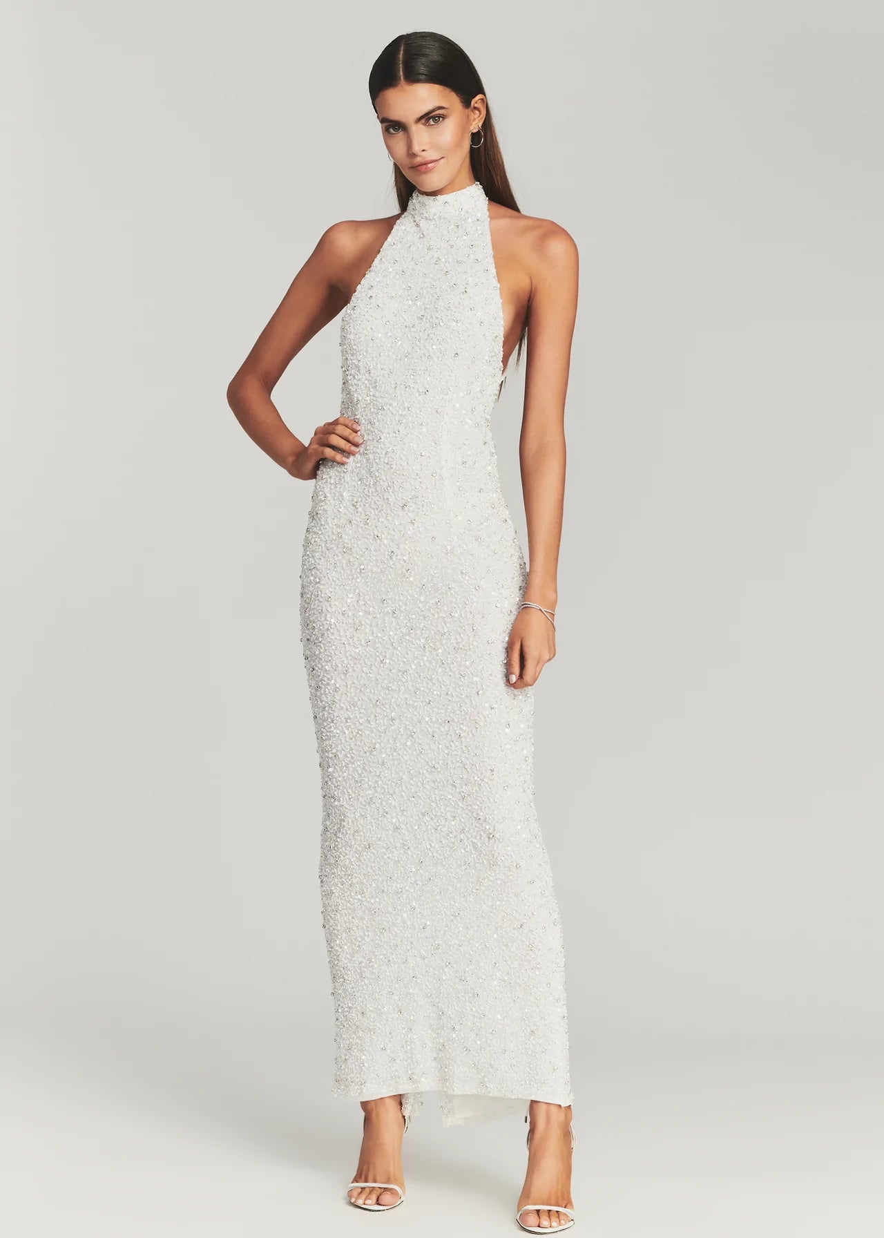 Retrofete Olivia dress. Floor length beaded white halter gown with open low back.